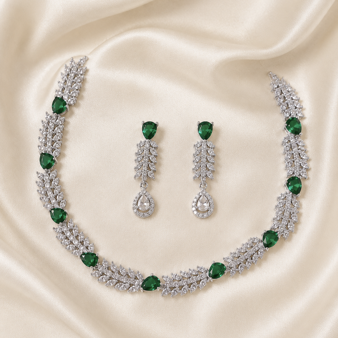 Elyselle Scarlet Emerald AD Necklace Set on satin background