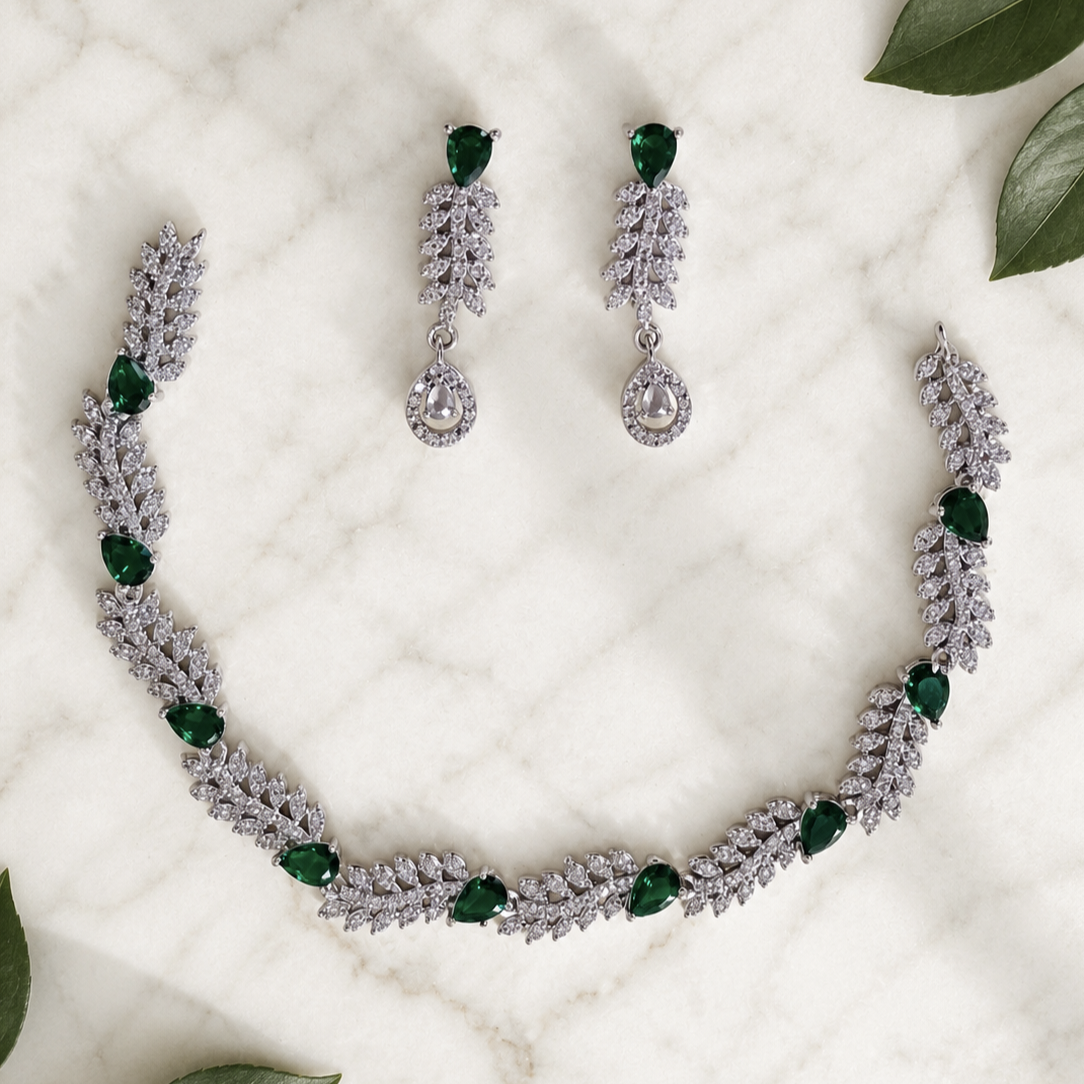 Elyselle Scarlet Emerald AD Necklace Set on marble background