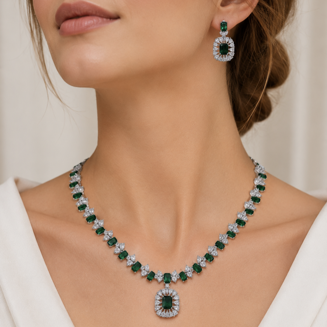 Model wearing Elyselle Serene Emerald AD Necklace Set