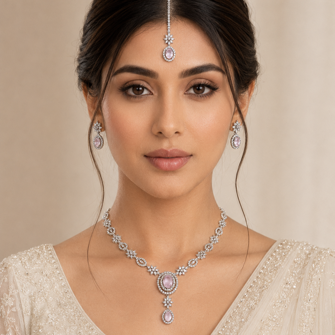 Model wearing Elyselle Luna Blush AD Necklace Set
