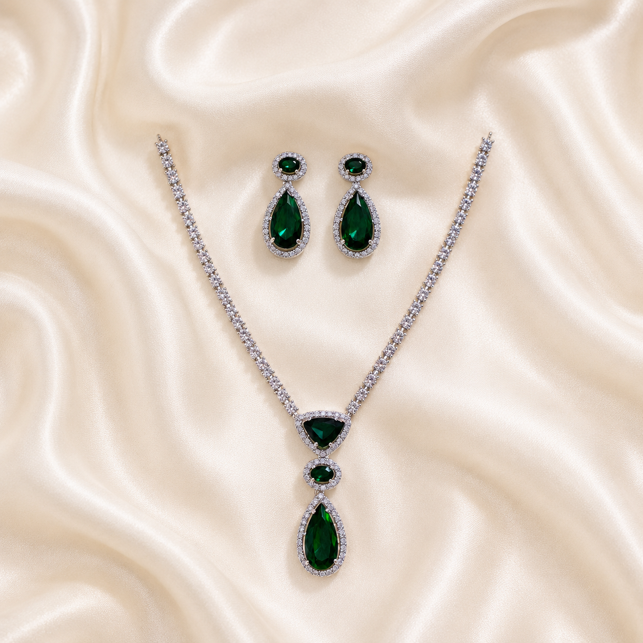 Elyselle Celeste Emerald AD Necklace Set on satin background