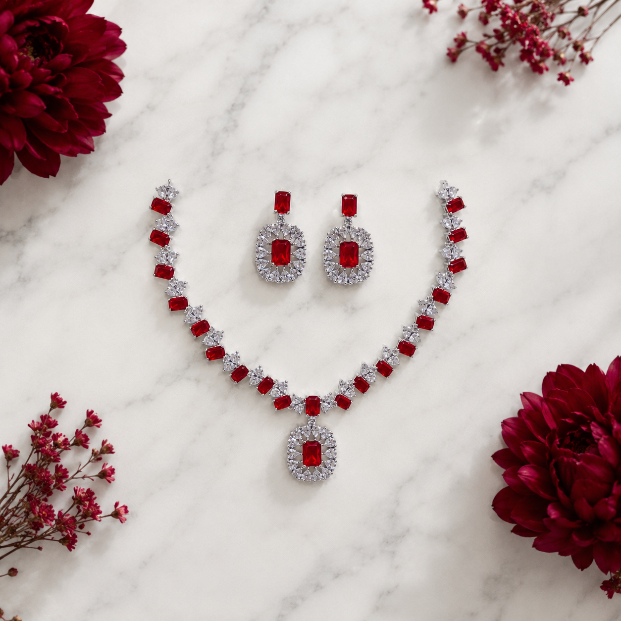 Elyselle Serene Ruby AD Necklace Set on marble background