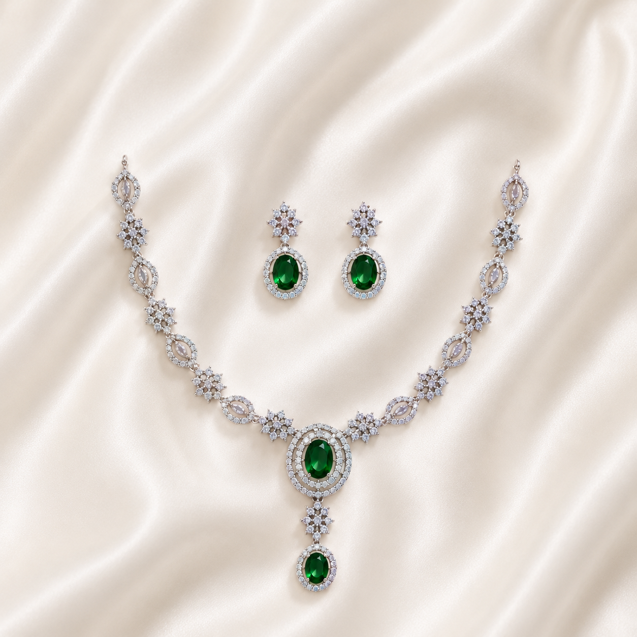 Elyselle Luna Emerald AD Necklace Set on satin background