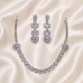 Elyselle Bloom Crystal AD Necklace Set on satin background
