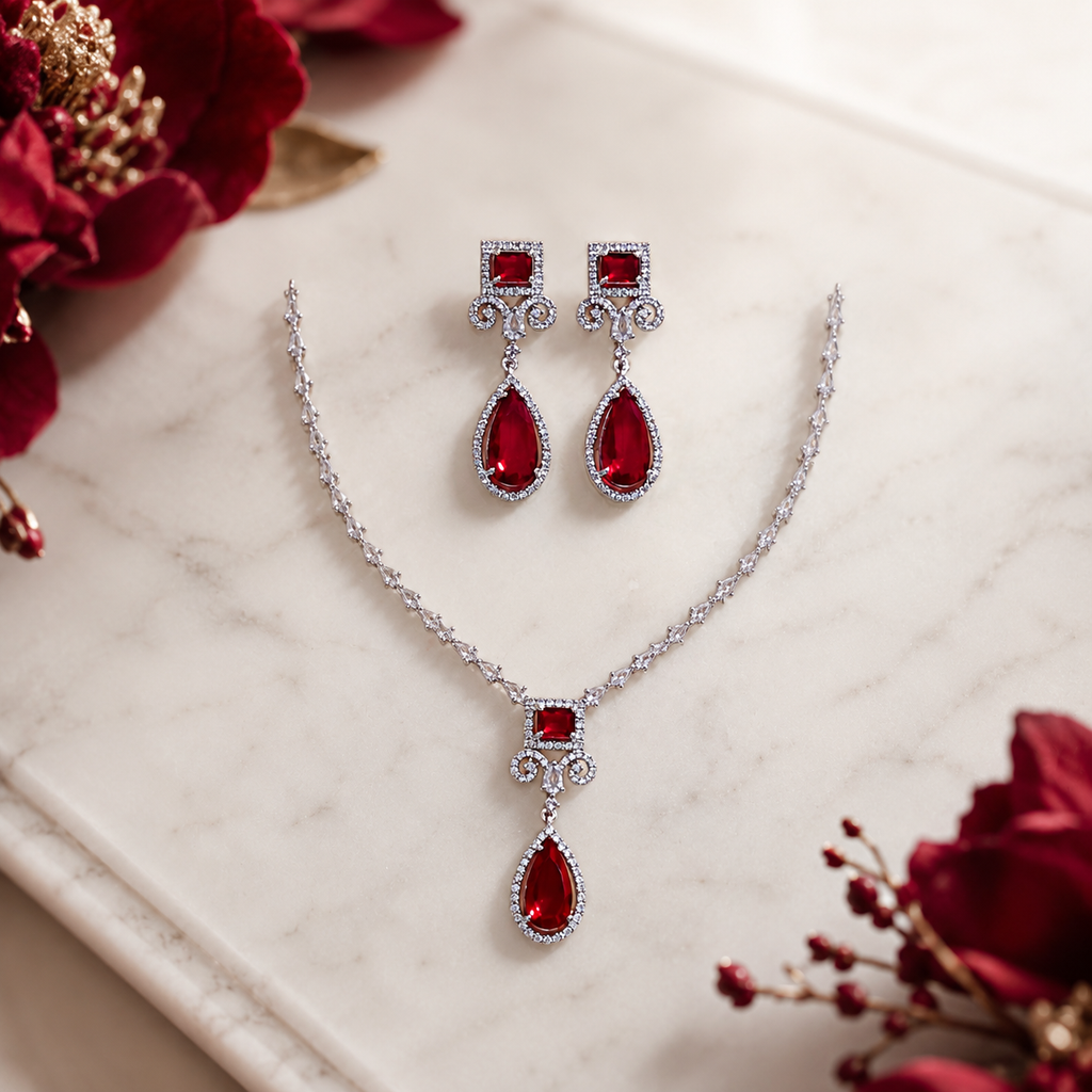 Elyselle Elara Ruby AD Necklace Set on marble background