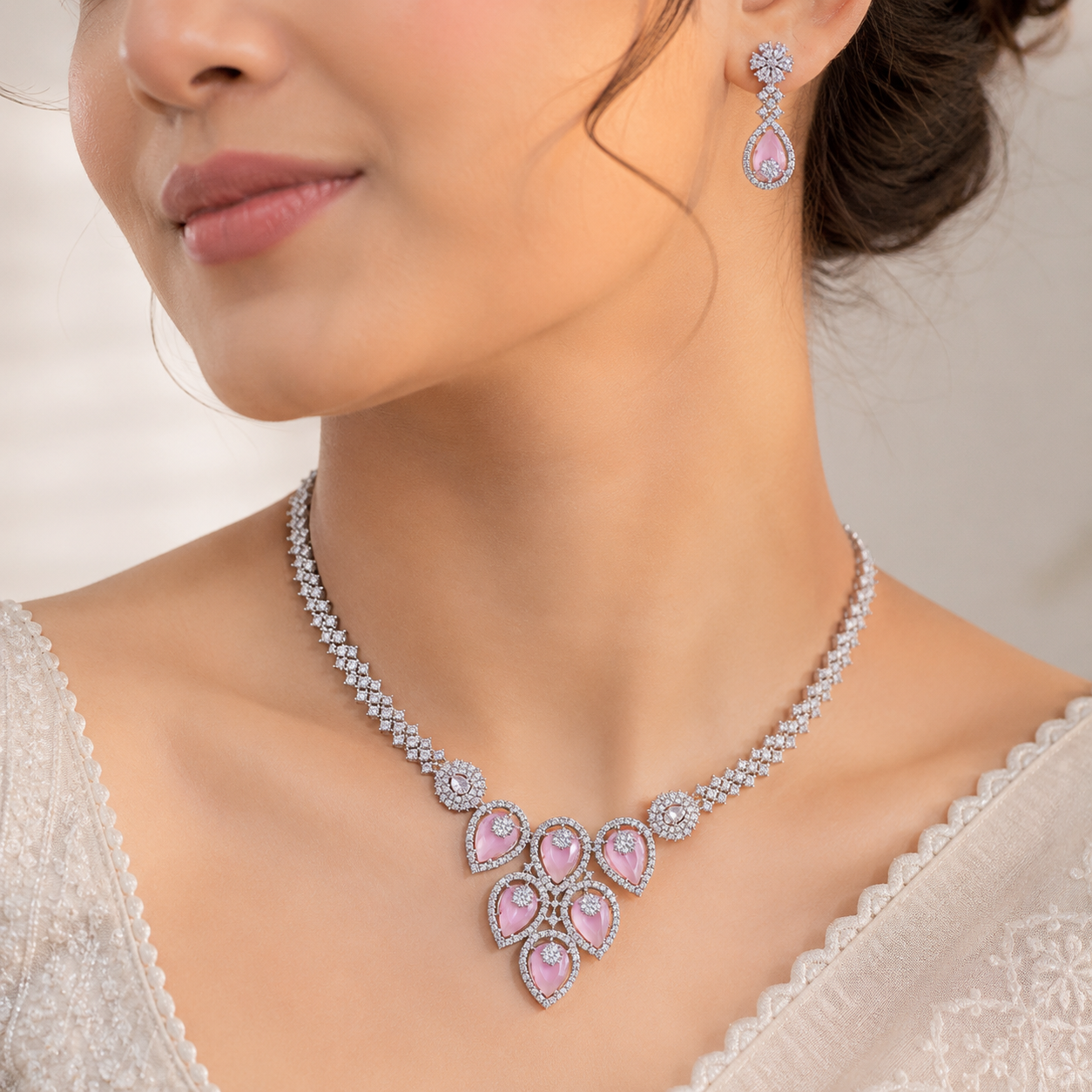 Model wearing Elyselle Aurora Blush AD Necklace Set