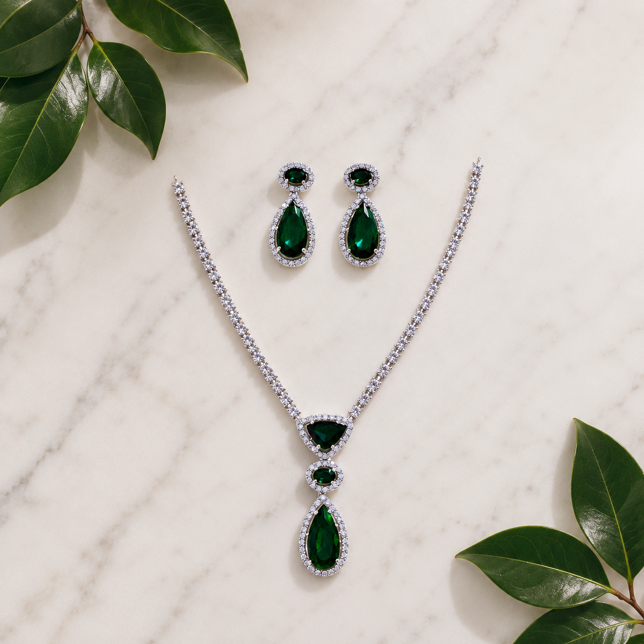 Elyselle Celeste Emerald AD Necklace Set on marble background