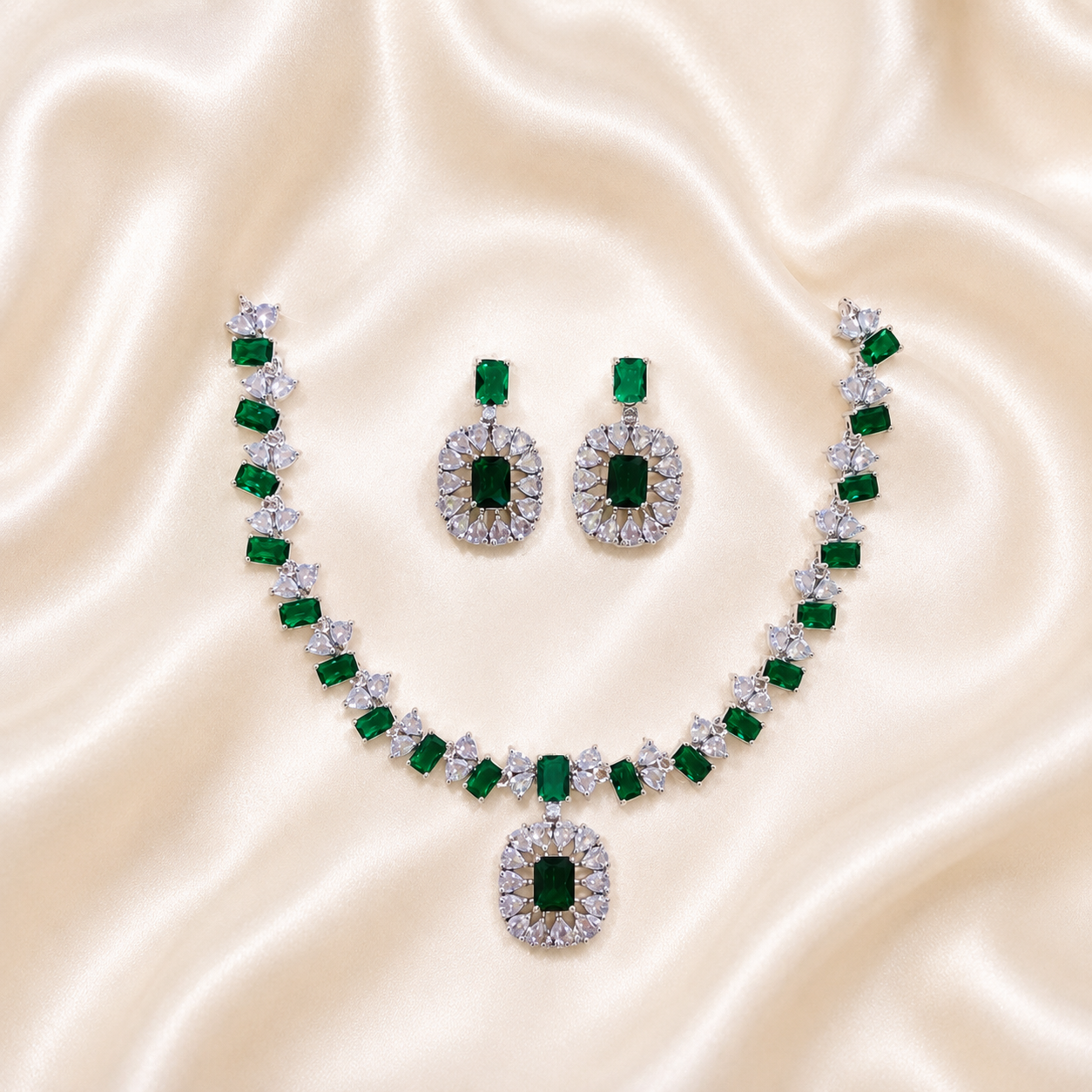 Elyselle Serene Emerald AD Necklace Set on satin background