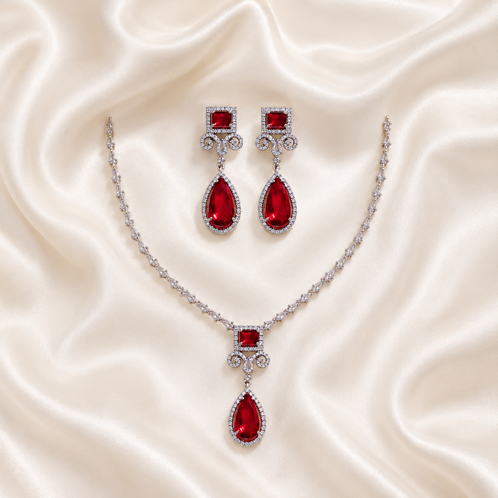 Elyselle Elara Ruby AD Necklace Set on satin background