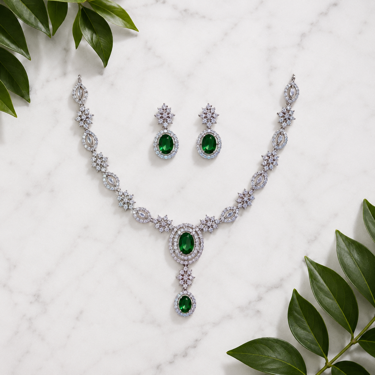 Elyselle Luna Emerald AD Necklace Set on marble background
